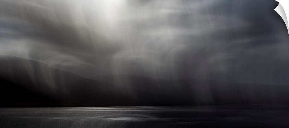 A monochrome black and white impressionistic seascape from the Scottish Island of Harris and Lewis wisth falling soft rain...