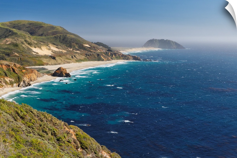Big Sur Coast with Coastal Route 1 and the Point Sur Lighthouse, California, USA.
