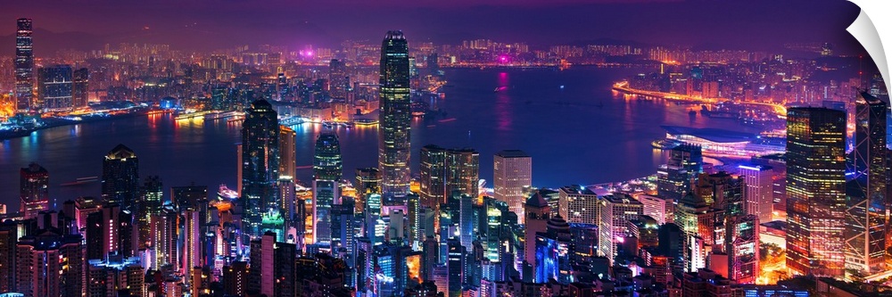 Panoramic image of the vibrant city of Hong Kong, China at night.