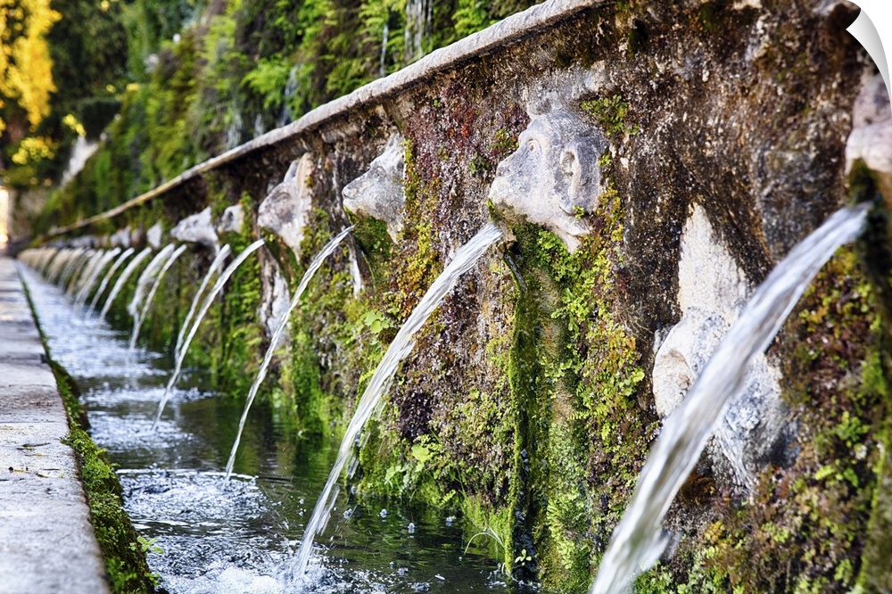 The Hundred Fountains covered in moss at the Villa d'Este in Tivoli, Italy.