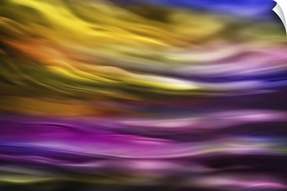 Abstract photograph of blurred and blended colors and flowing lines in shades of purple and yellow.
