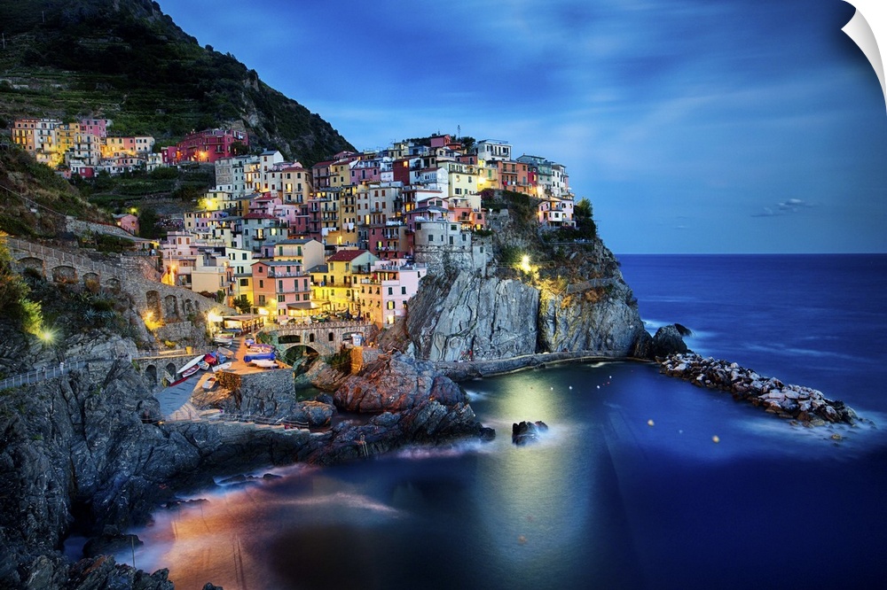 Cliffside town at night, Manarola, Liguria, Italy.