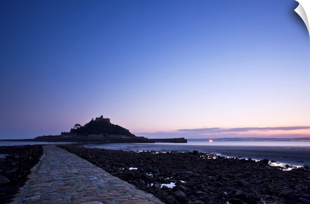 A beautiful cool blue dawn over the causeway at St. Michaels Mount in Cornwall, England, UK.