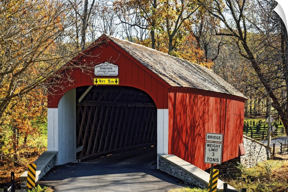 Scenic Fall View of the Knechts Covered Bridge over the Crook Creek, Bucks County, Pennsylvania, USA