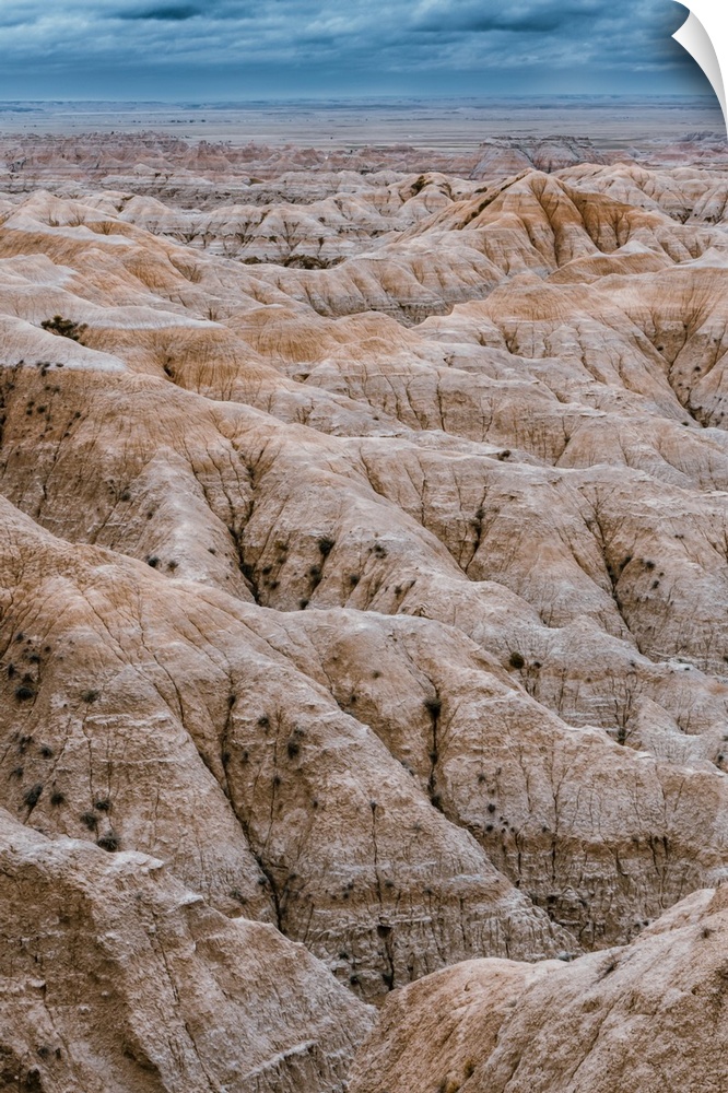 Striking geologic deposits and layered rock formation in Badlands National Park South Dakota.