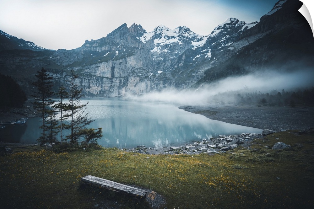Lake surrounded by mountains in the Swiss Alps