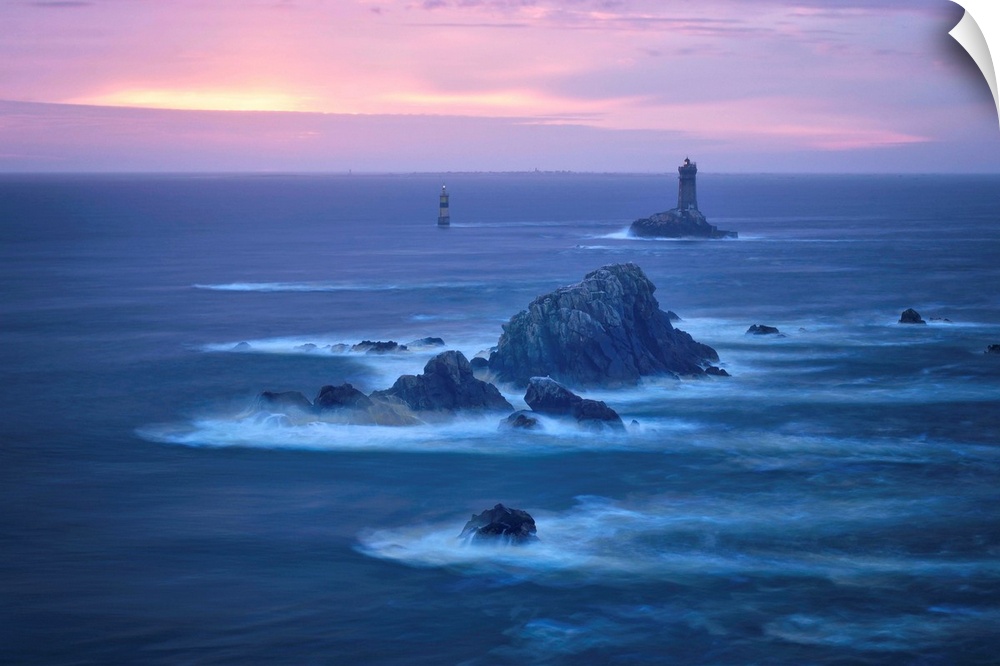 Pink sunset at Pointe du Raz in France, Finistere, Brittany, with, la vieille, lighthouse in the middle of the sea.