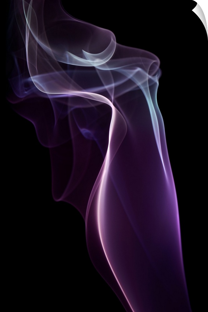 A photograph of colorful sinuous smoke against a black background.