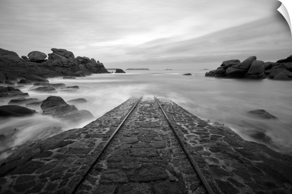 A place in Brittany called, SNSM, road for boats going into the sea, in black and white.