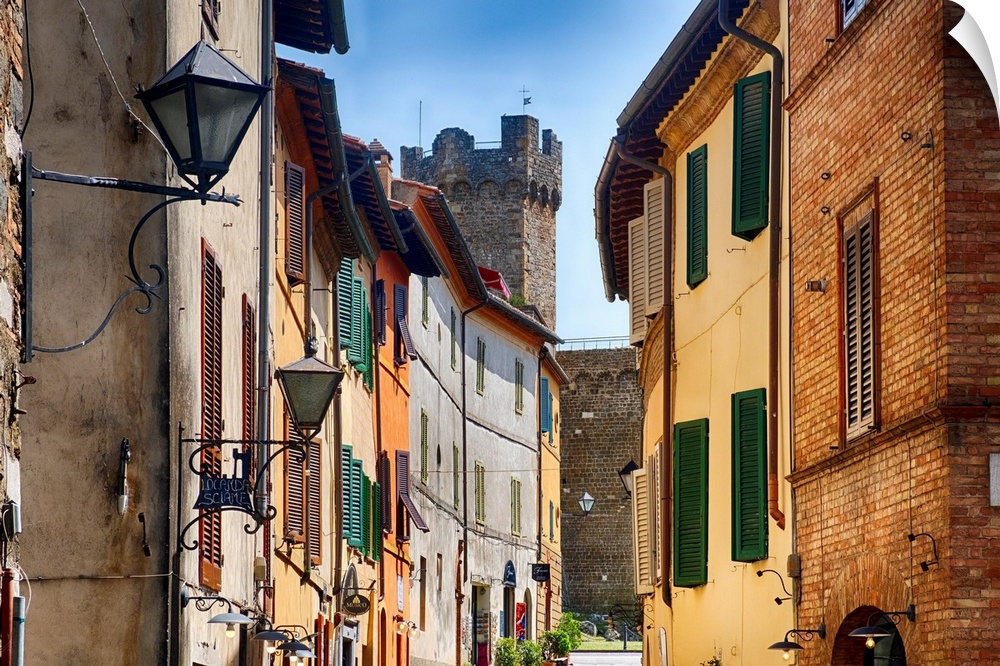 Street in Montalcino with the Castle Tower, Tuscany Italy.