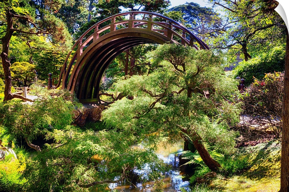 Moon Bridge Over a Small Creek in a Japanese Garden.