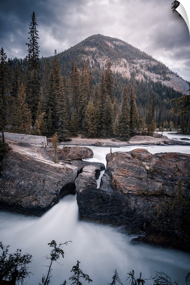 Silky water from long exposure at Natural Bridge of Yoho National Park on the western slopes of the Canadian Rocky Mountains.