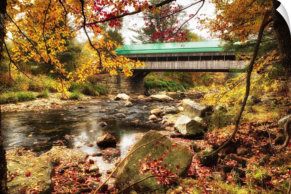 Fine art photo of a covered bridge in New England over Ellis River in autumn.