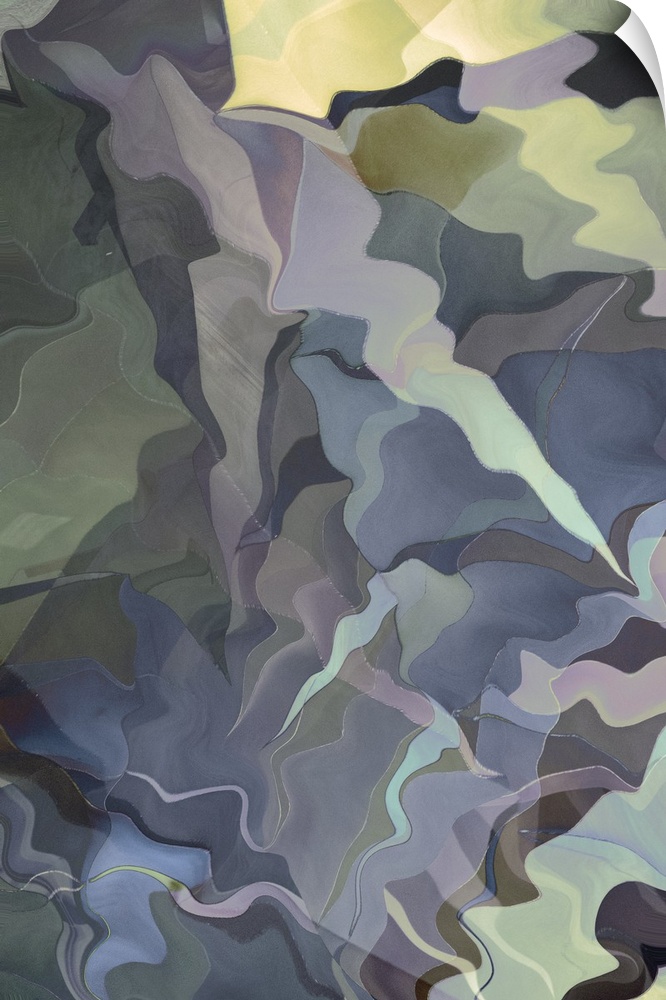 Abstract photograph made of wavy shapes in varying grey shades.