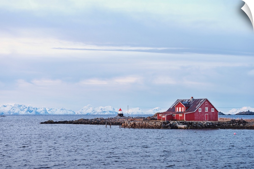 Fjord in Norway with a red wooden house