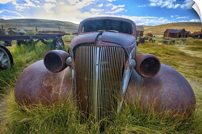 Old Car Rusting Away in a Ghost Town