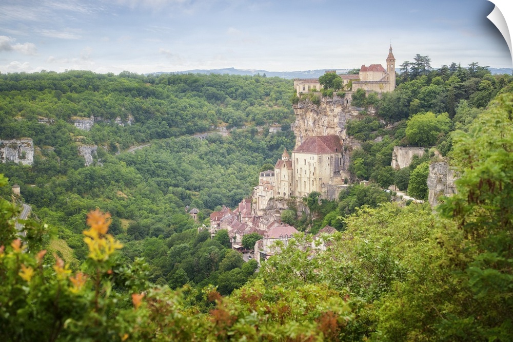 Landscape view of Rocamadour, old medival city in The south of France on occitanie area.
City in the middle of a green fo...
