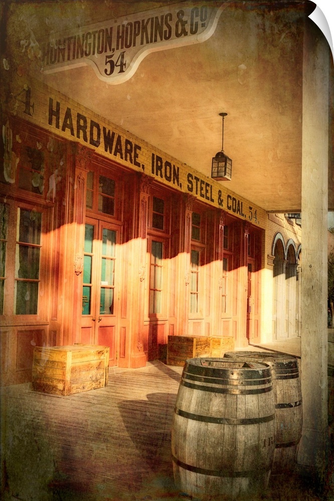 A photo of a storefront from a frontier town that has been edited to an antique effect.