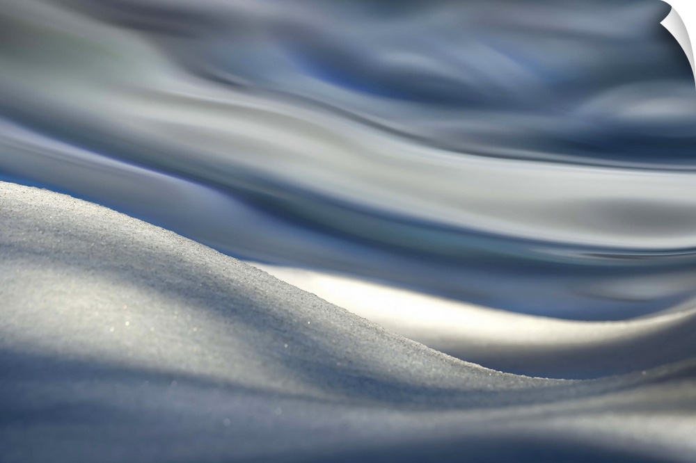 Sloping snow blurring into abstract shapes.