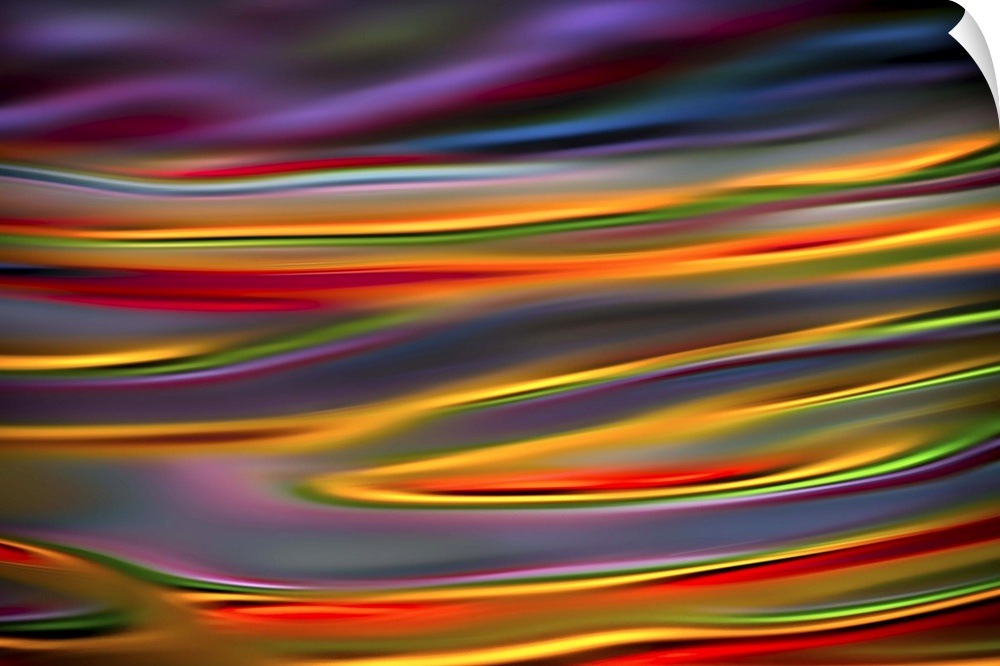Abstract photograph with dreamy lines in hues of the rainbow.