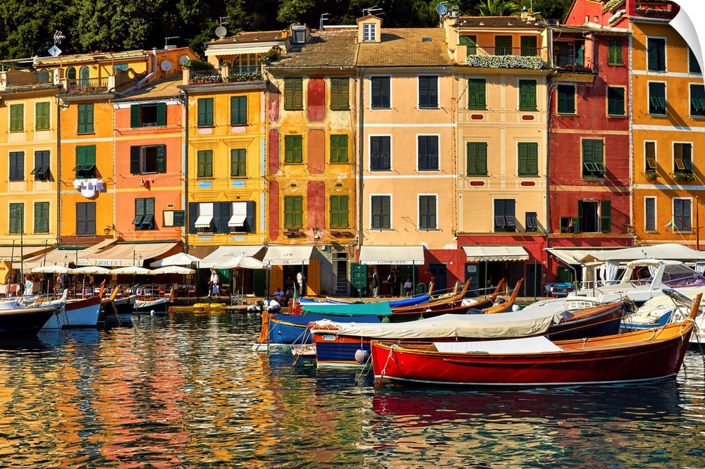 Small boats and colorful old houses in Portofino Harbor, Liguria, Italy.