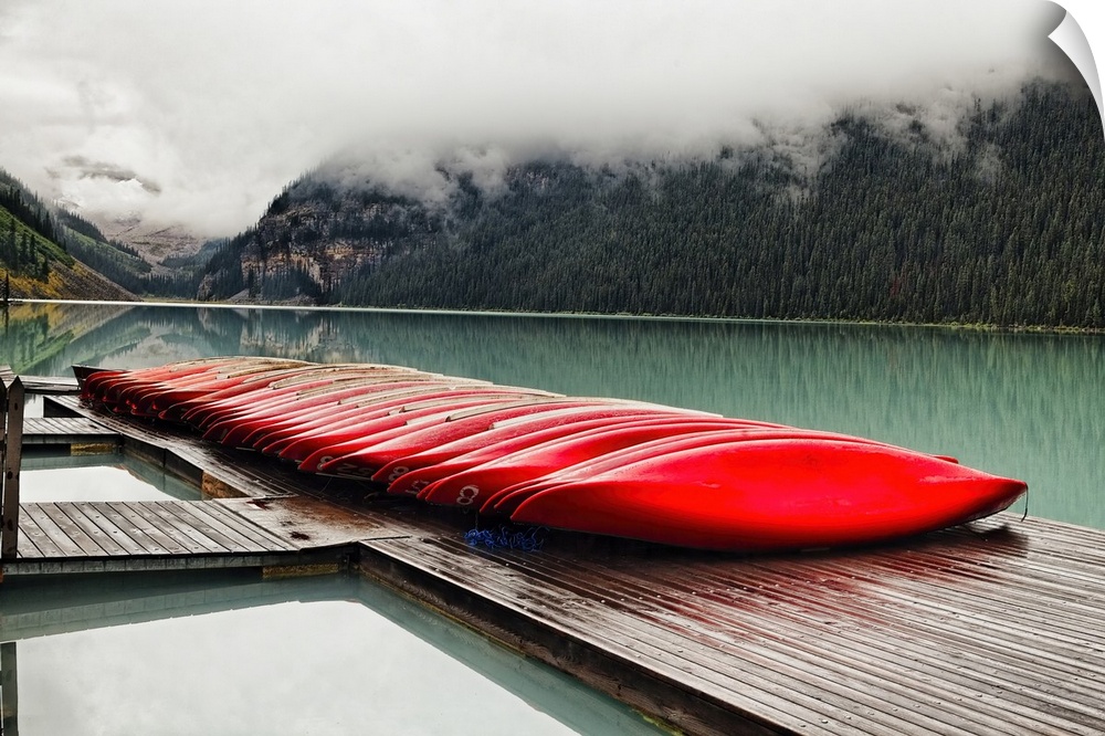 Low Angle View of a Dock with Red Boats, Lake Louise, Alberta, Canada