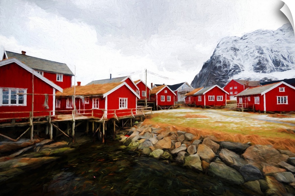A photograph of a red building village in a mountain landscape.