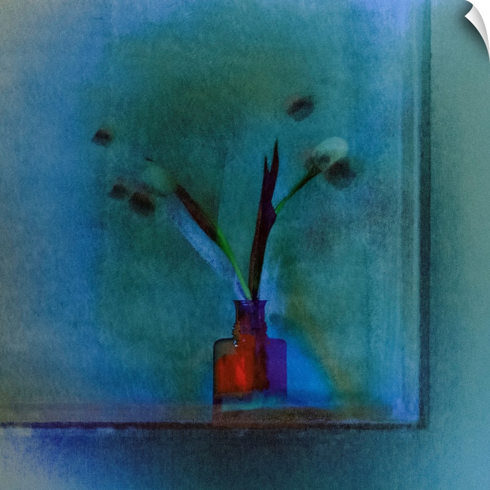 Square image of a bright red vase with long stemmed tulips on a blue background.