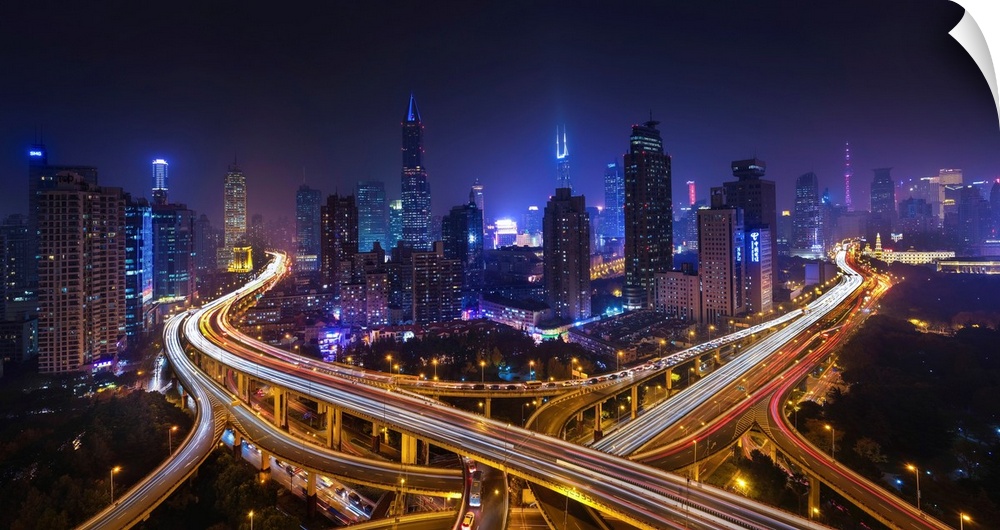 Horizontal city skyline of Shanghai, China at night.