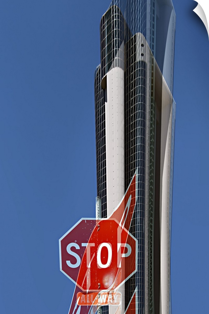 Image of a stop sign and a skyscraper in the distance, with a warped version layered over it.