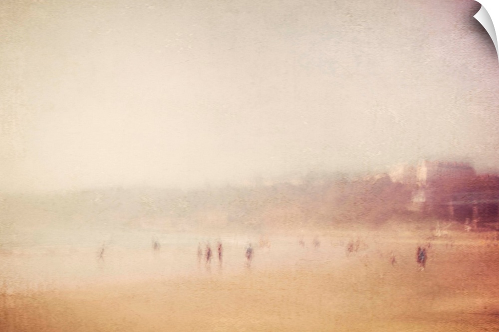 A vintage textured dreamy blurred image of Scarborough seaside beach, England, on a hot summers day with children playing ...