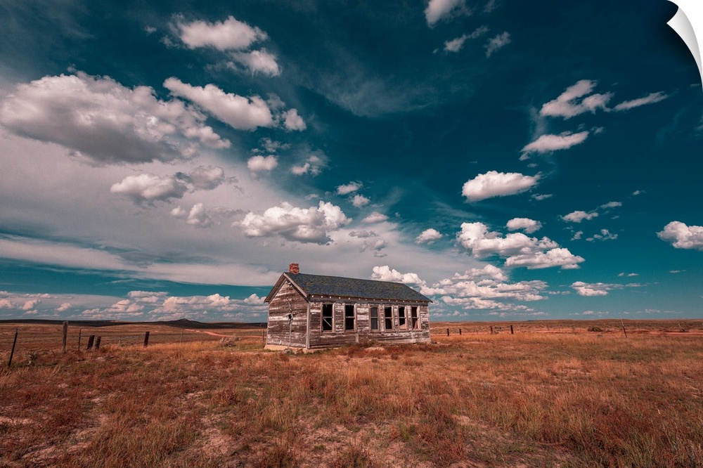 Beautiful clouds over lone house at Thunder Basin National Grassland, Wyoming