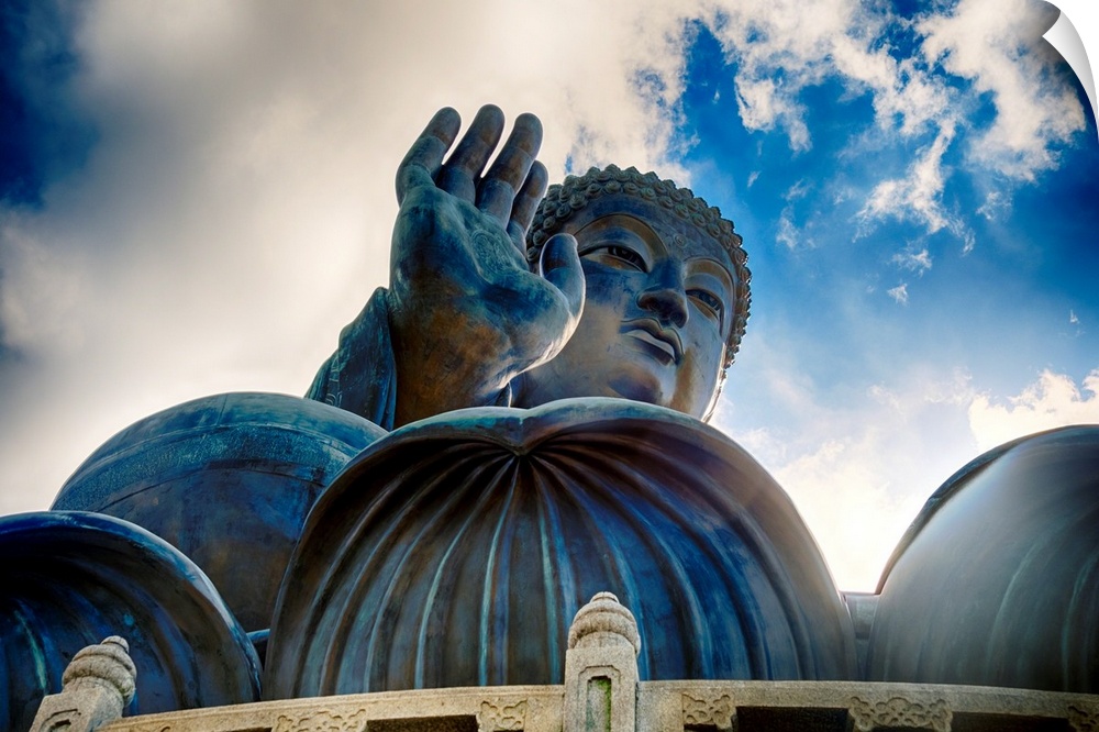 Low angle view of the Tian Tan Buddha Statue, enthroned on a lotus flower, Ngong Ping, Lantau Island, Hong Kong, China.