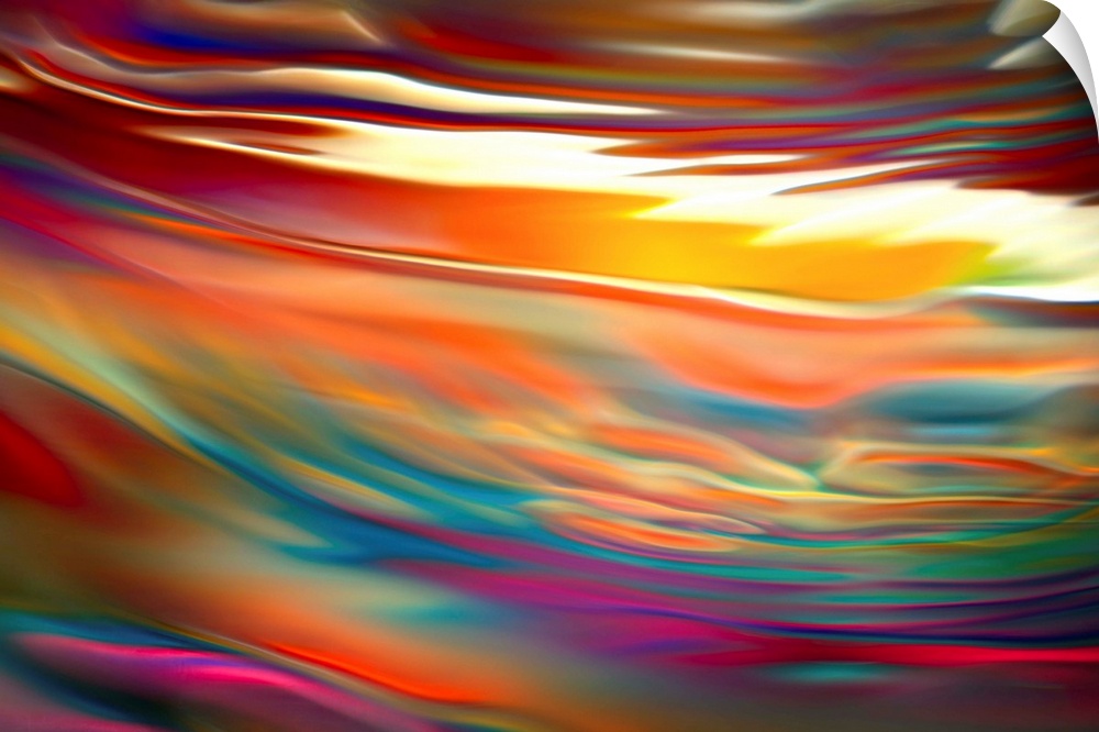 Artistic abstract photograph of a close-up of a multi-colored water.