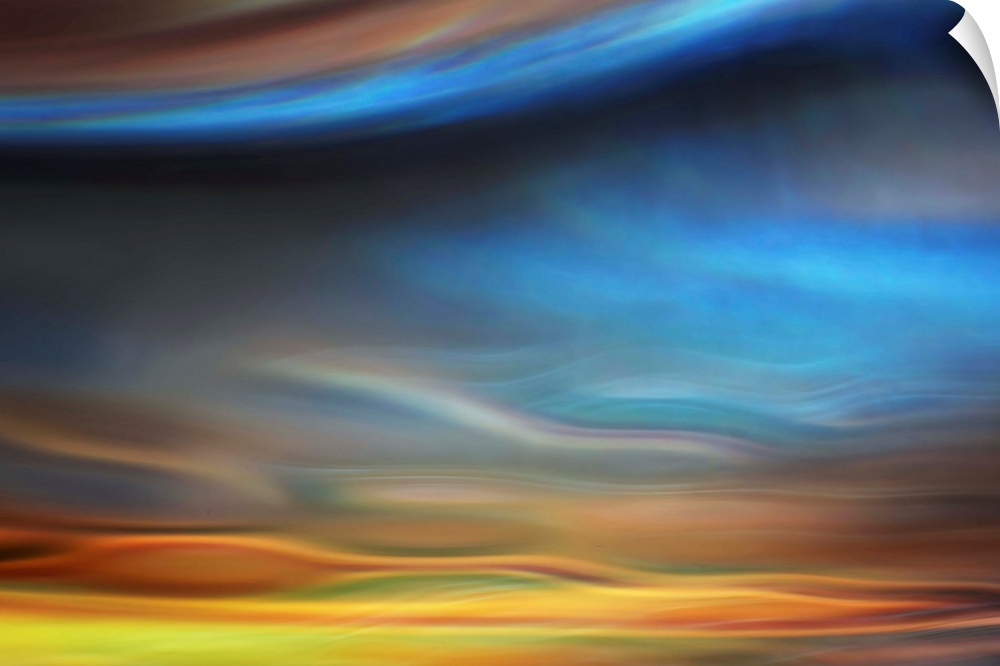 Abstract photo of smooth waves resembling the sky at sunset.