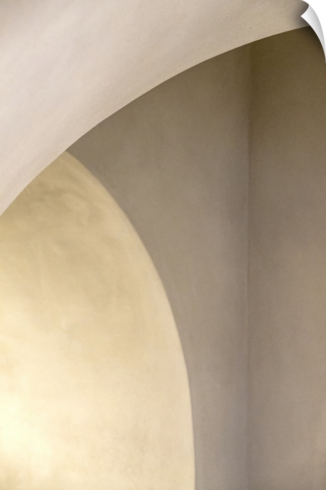 Abstract photo of curved arches with white light.