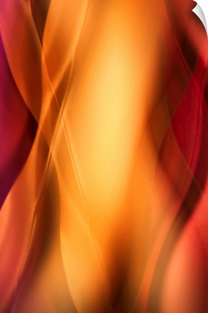 Contemporary abstract photograph of blurred vertical waves and lines of light depicting the curves of a female body.