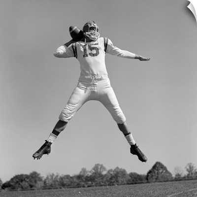 1960's Quarterback Jumping And Throwing Pass
