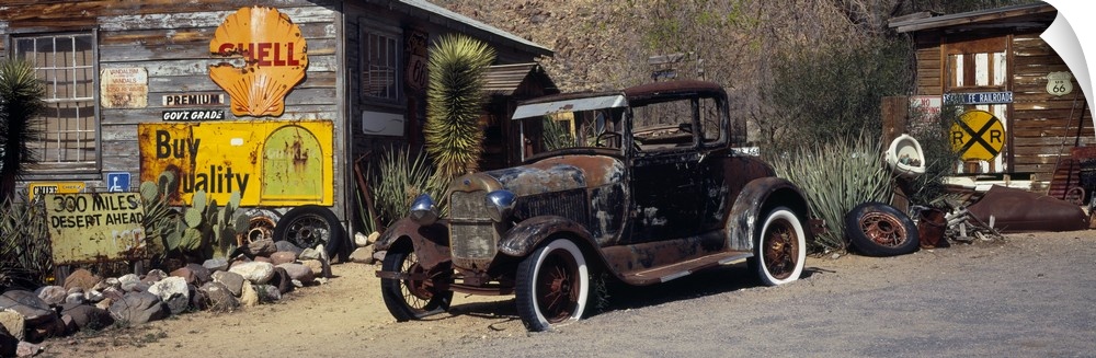 Abandoned vintage car at the roadside Route 66 Arizona