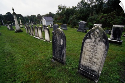 Acid rain coating cemetery headstones, New York