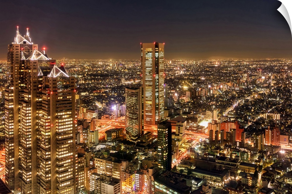 Aerial view of a city at night, Shinjuku Park Tower, Shinjuku, Tokyo, Japan.