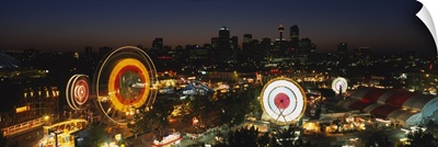 Aerial view of ferris wheels lit up at night, Calgary Stampede, Calgary, Alberta, Canada