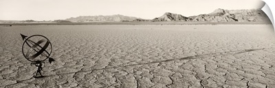 Armillary sphere on dry lake bed, Mojave Desert, California