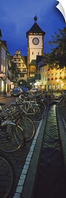 Bicycles parked along a stream near a road, Freiburg, Baden-Wurttemberg, Germany