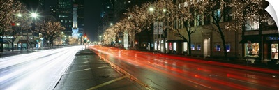 Blurred Motion Of Cars Along Michigan Avenue Illuminated With Christmas Lights, Chicago, Illinois