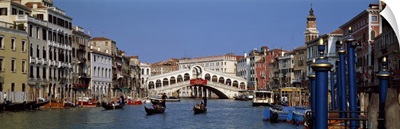 Bridge across a canal Rialto Bridge Grand Canal Venice Veneto Italy