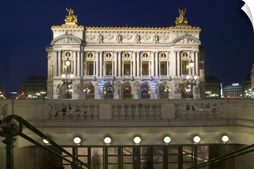 Building lit up at dusk, Opera Garnier, Paris, France