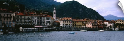 Buildings at the lakeside viewed from a ferry, Lake Como, Menaggio, Como, Lombardy, Italy