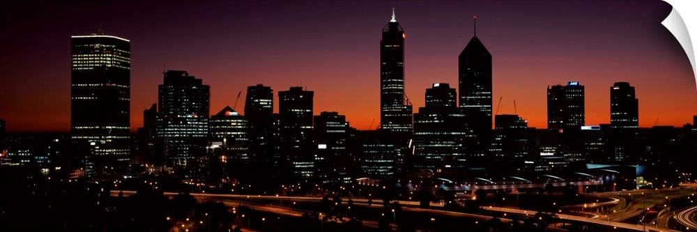 Buildings lit up at dawn, Perth, Western Australia, Australia