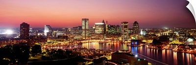 Buildings lit up at dusk, Baltimore, Maryland